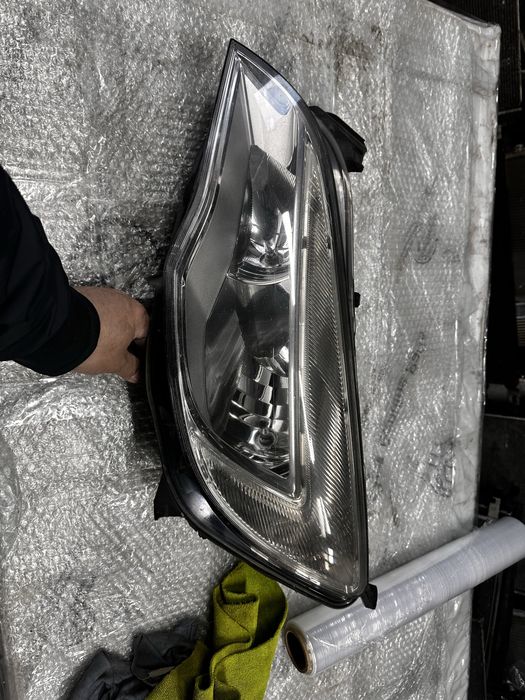 Far stânga opel astra j.cod::1eg010011-01.