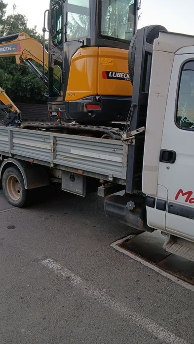Transport marfa nisip .piatra .balast .moloz.