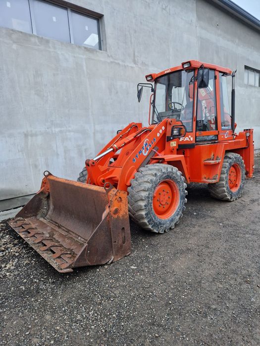 Buldoexcavator FA KOMATSU 698