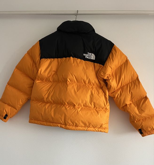 Geaca originala The North Face cu pene si puf