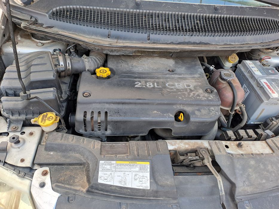 Vînd Chrysler Grand Voyager