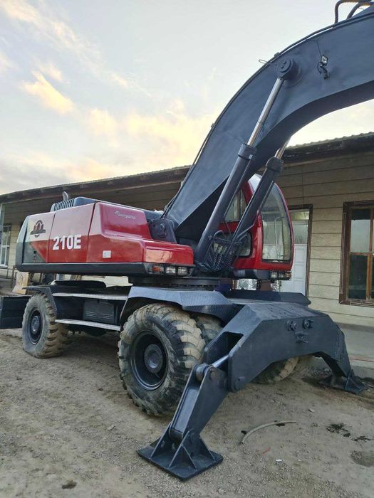 Экскаватор (ишлаб турибти)