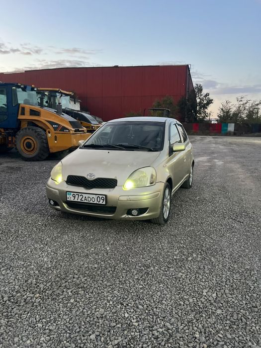 Тойота Vitz, 2004