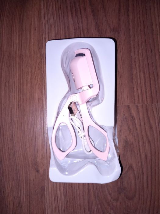 Електрическа миглоизвивачка