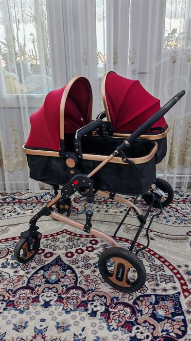 Продам двойную коляску для близнецов
