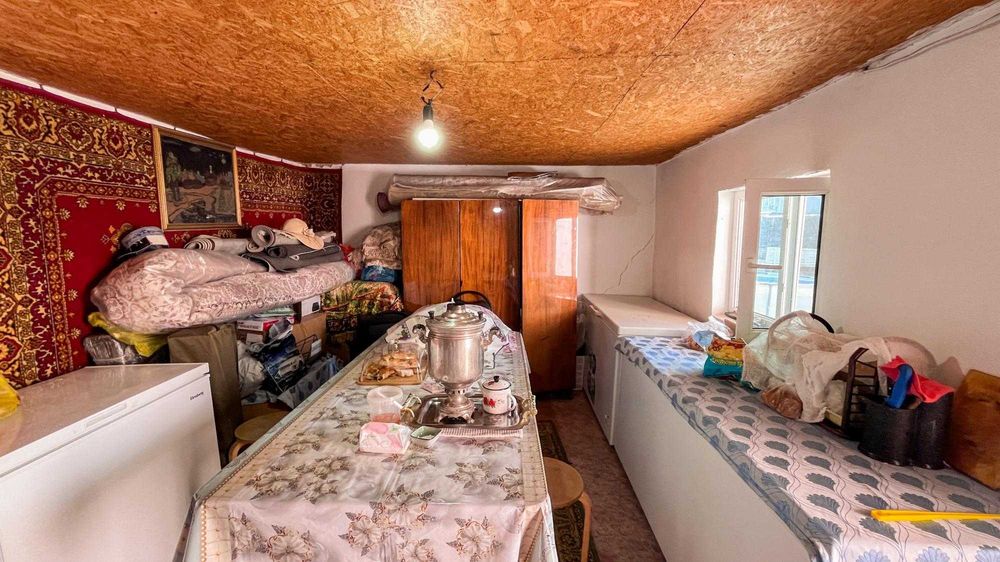 Дом в Отенай, Танат Империя
