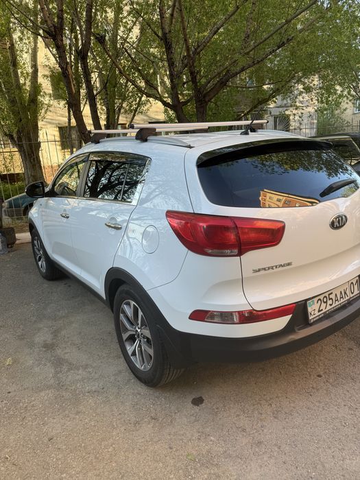 Kia sportage 2014 год