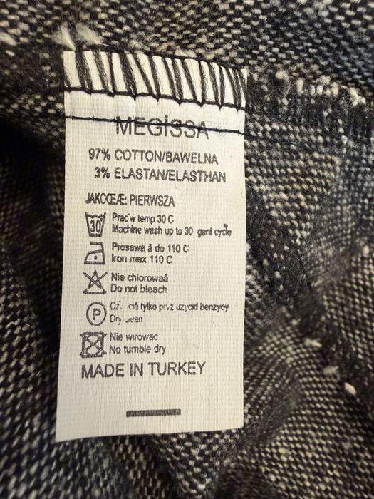 Pantaloni trei sferturi