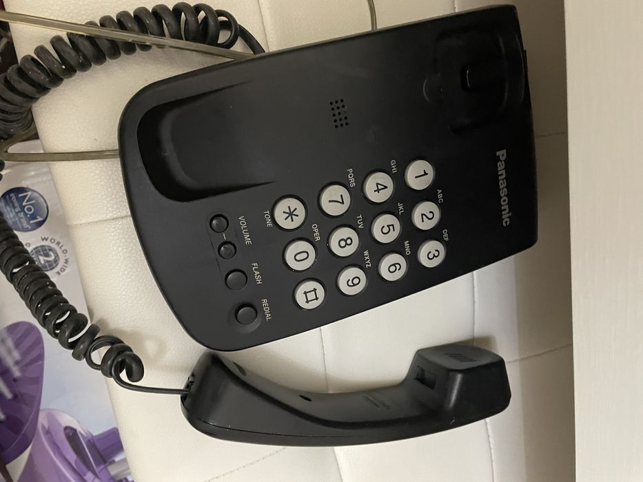 Продам проводной телефон
