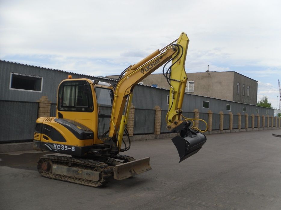 Услуги мини-экскаватора.