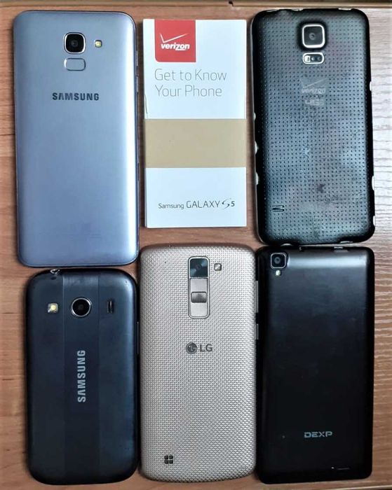 Сотовые телефоны на запчасти.