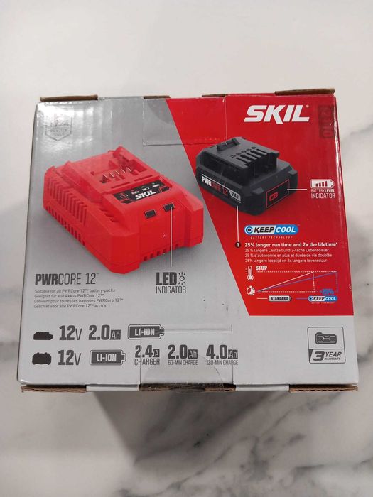 SKIL inacarcator cu acumulator 12v nou