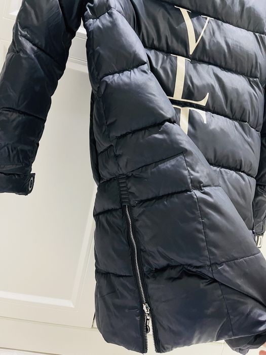 продам темлую куртку