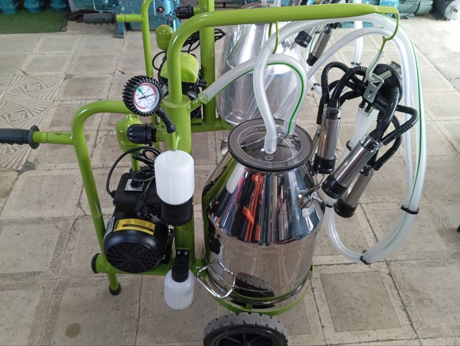 Сут согадиган. Доилный аппарат. Сигир согадиган.