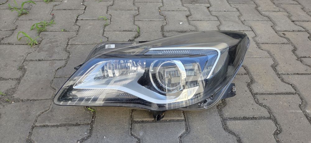 Far stanga cu lupa Opel Insignia facelift  an 2014