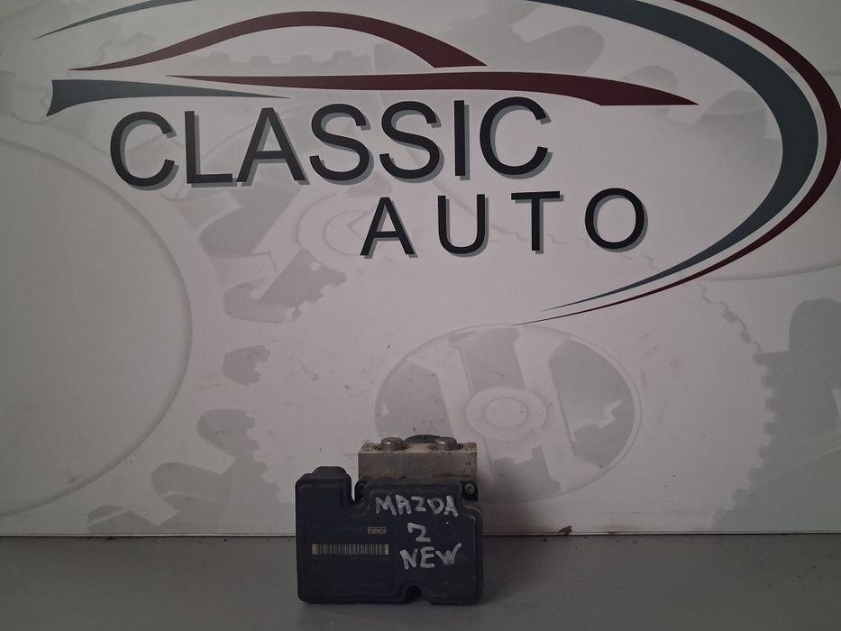 ABS блок Mazda 2 1.3i 2009г.