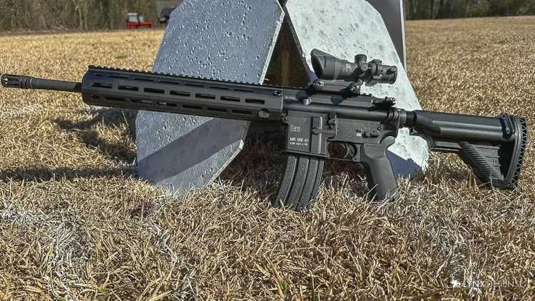 Super pusca HK 416d carabina de asalt 6mm,luneta,lumina led,demontabila,bile bonus !