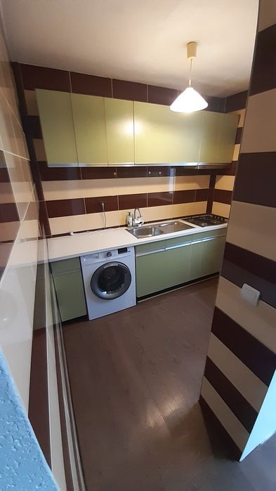 Garsoniera etajul 1 în bloc de cărămidă