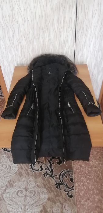 Продам женский пуховик