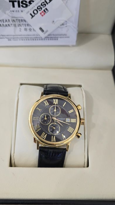 Продам золотые часы Tissot