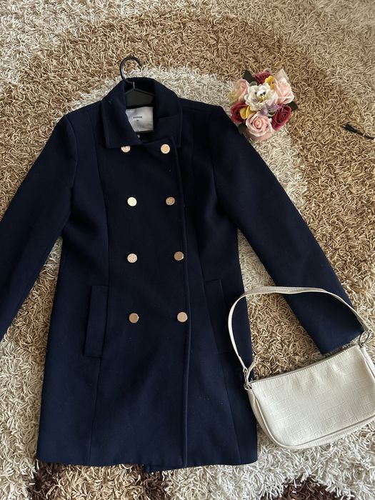 Палто на марката minimum.