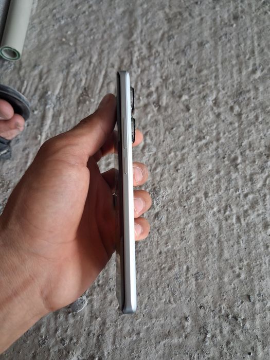 Xiaomi HyperOS ..