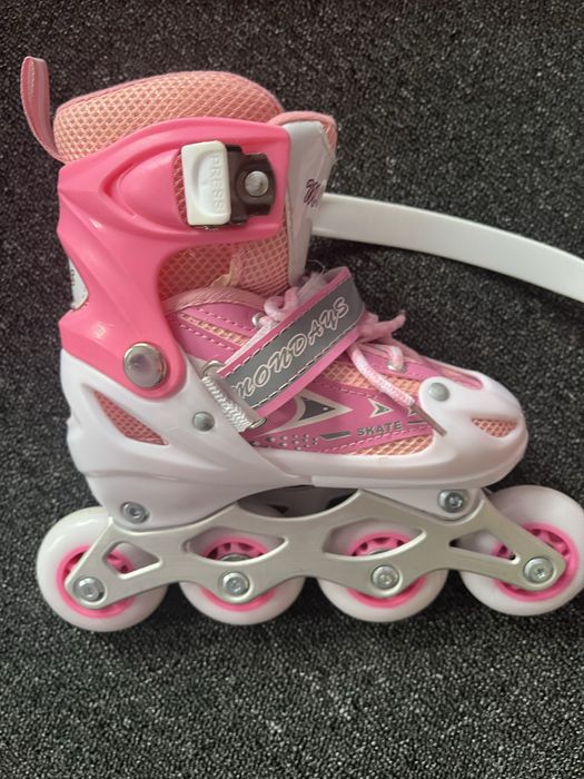 Роликовые коньки