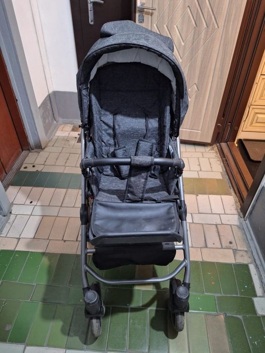 Детская передвижная коляска