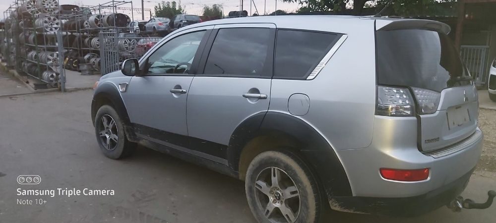 Dezmembrez Mitsubishi Outlander 2.0 diesel an 2008 cod motor BSY