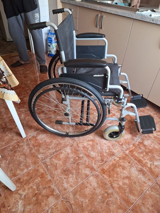 Scaun cu rotile in stare bună