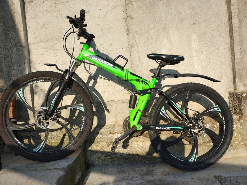 Vând bicicleta pliabilă 26"
