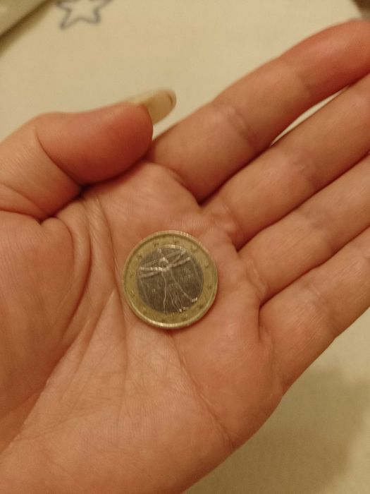 Moneda euro rara, de colecție, " Omul Vitruvian", 2002, preț 3000 lei.