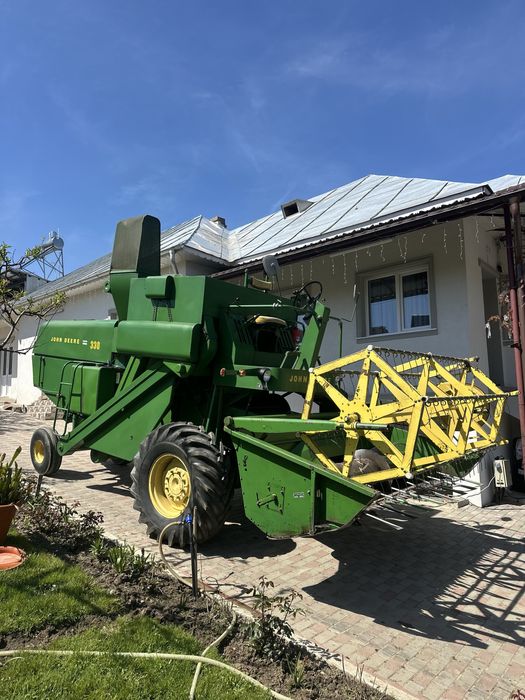De vanzare  combina John Deere 330