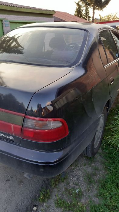 Тойота карина е механика.