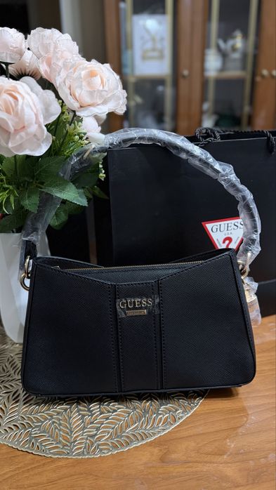 Оригинал сумки Guess