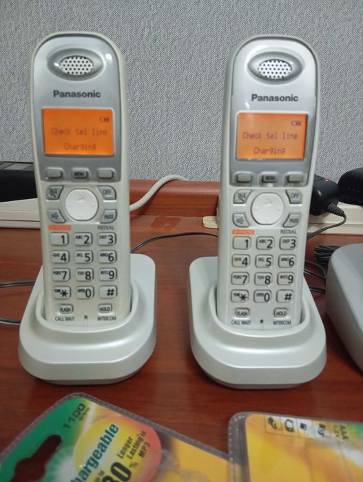 Продам радиотелефон PANASONIC три трубки на один телефонный номер.
