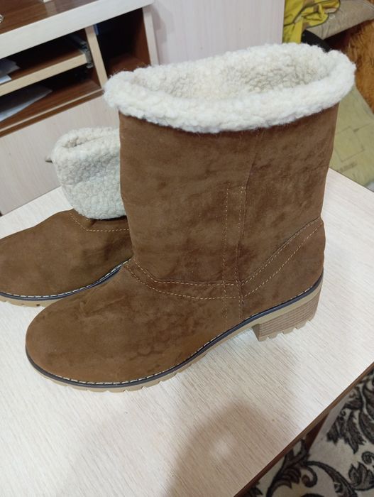 Продам зимние,новые сапоги.