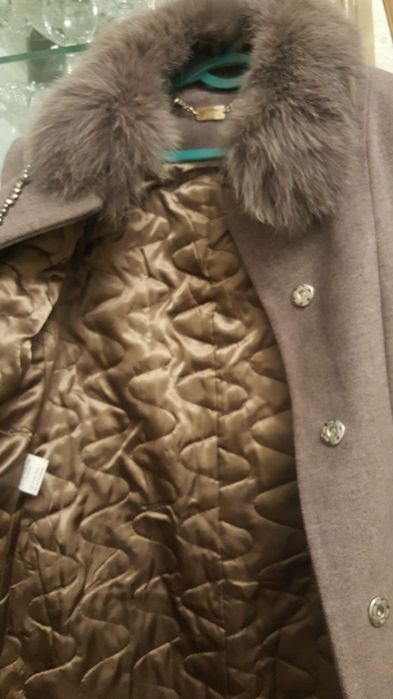 Palto holati yangi kiyilmagan