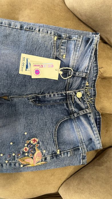 Джинсы новые