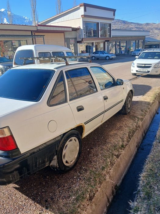 Нексия 1 сотилади яхши холатда ок ранг 2004 йил