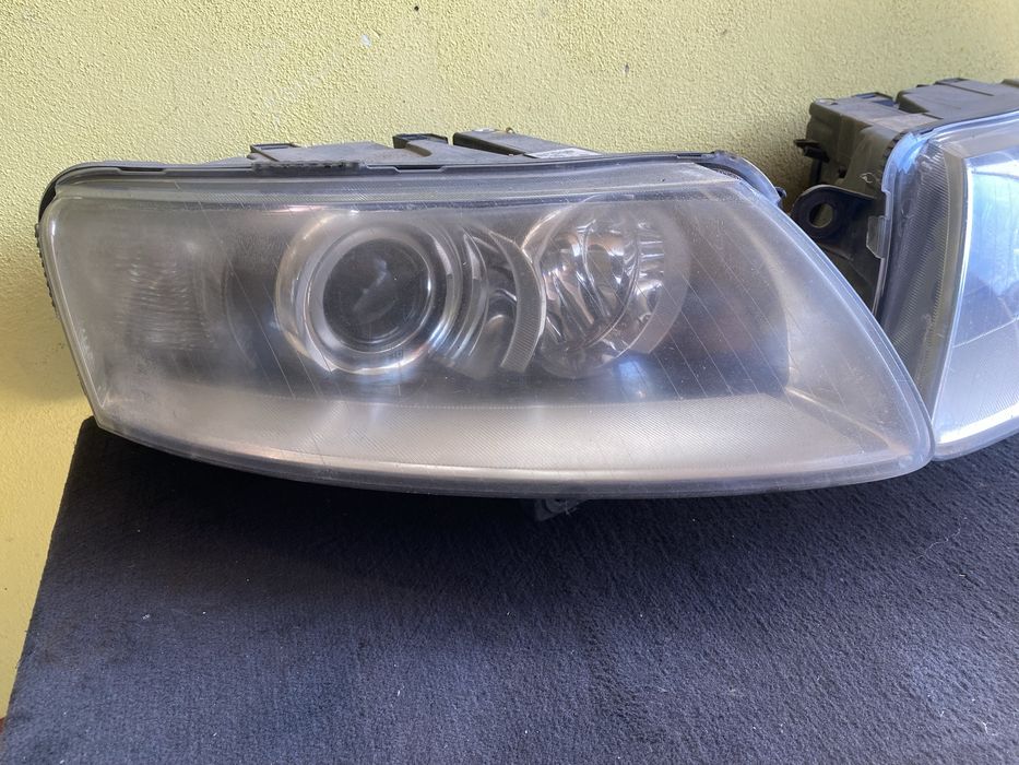 Faruri St/Dr Audi A6 C6 Xenon Pret 700 lei buc fara cleme rupte