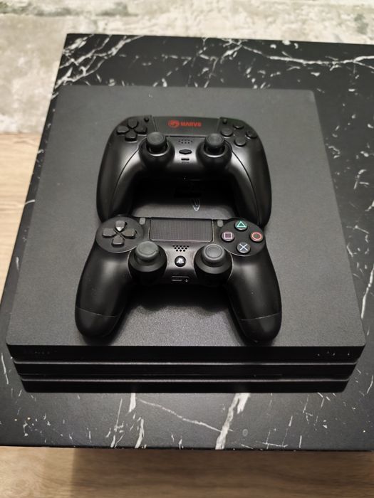 PS4 pro cu 2 controlare .Jocurile se vând la bucata separat(50 ron)