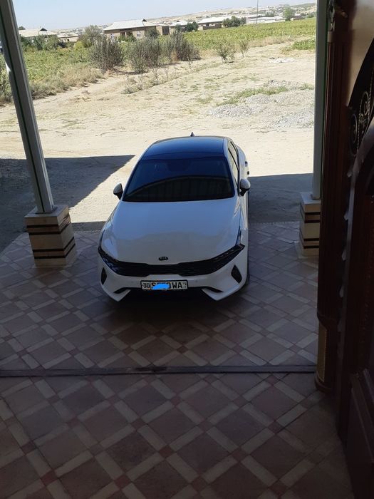 Kia k5 2021 beliy jemchug