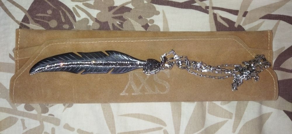 Колие стомана , перо