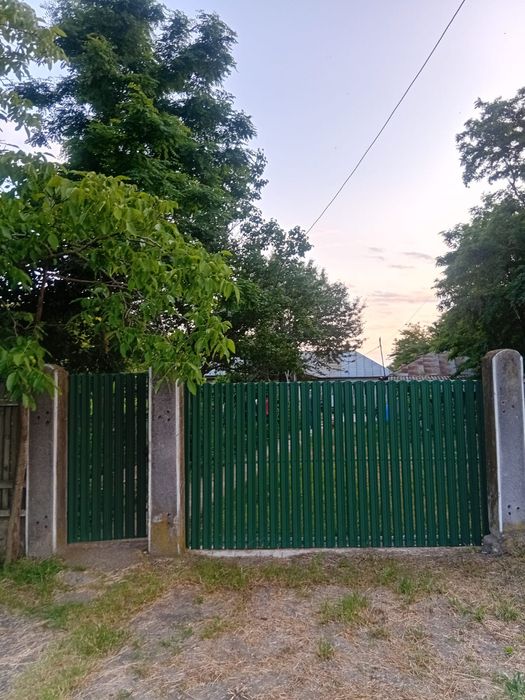 Gospodarie formata din 2 case cu pamant