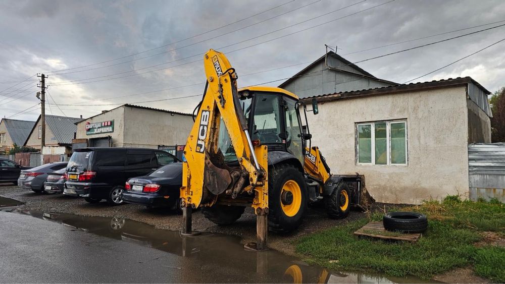 Экскаватор- погрузчик 3в 1