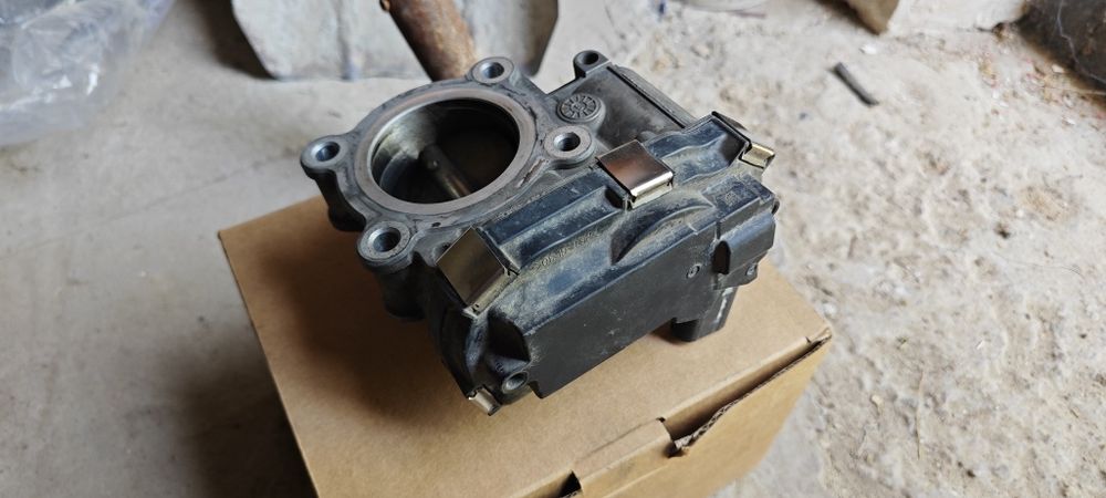 Дроссельный заслонка