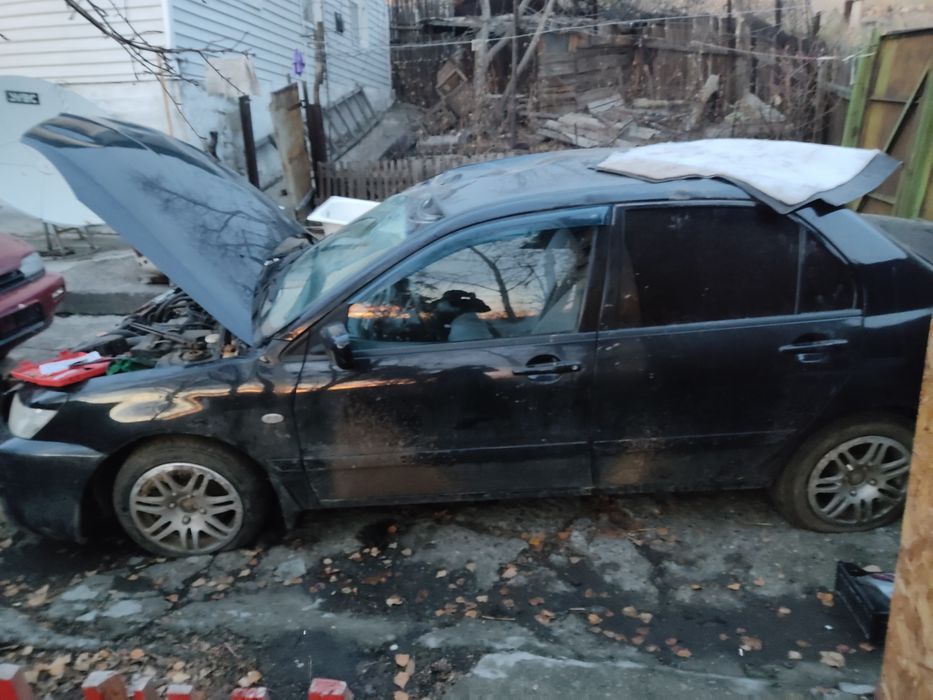 По запчастям Лансер