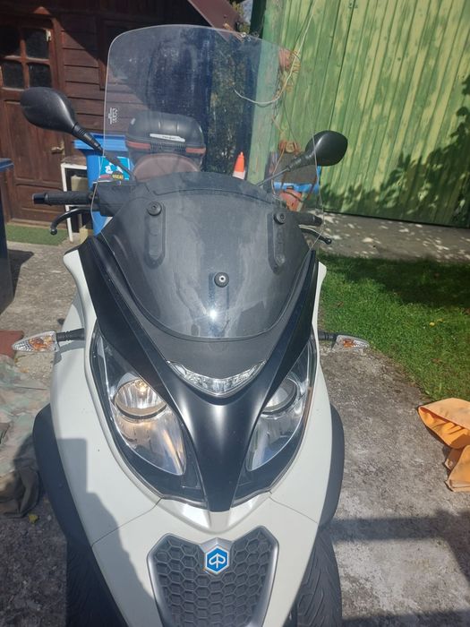 Piagio mp3 500 cmc se conduce cu B