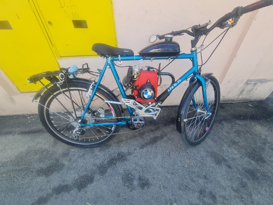 Vând  bicicletă cu motor de 49cc 4t  viteză maxim 60